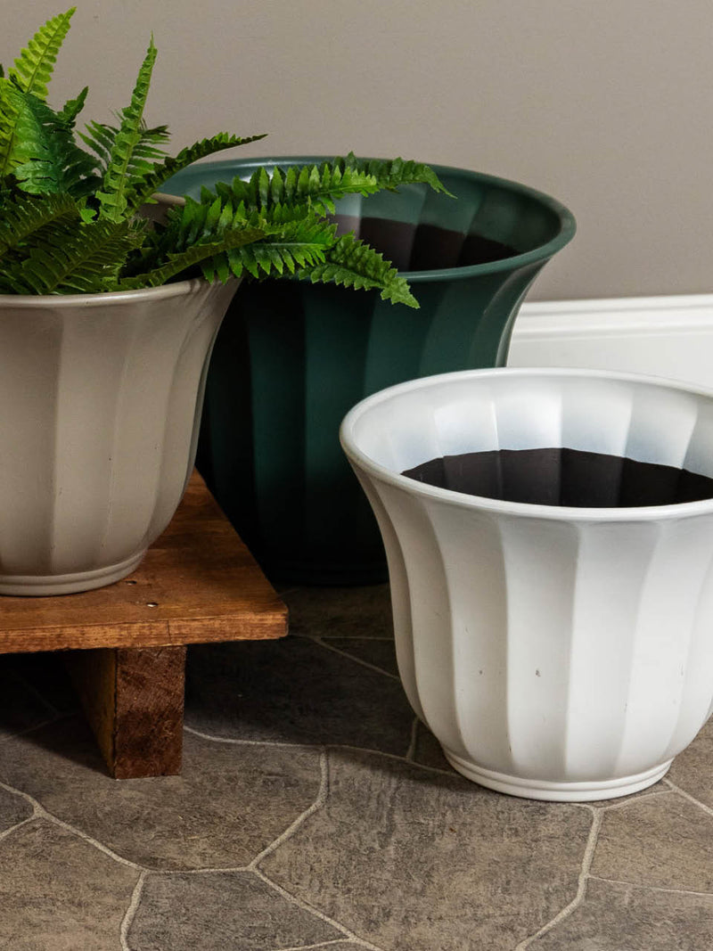 Plastic and resin planters in different colors